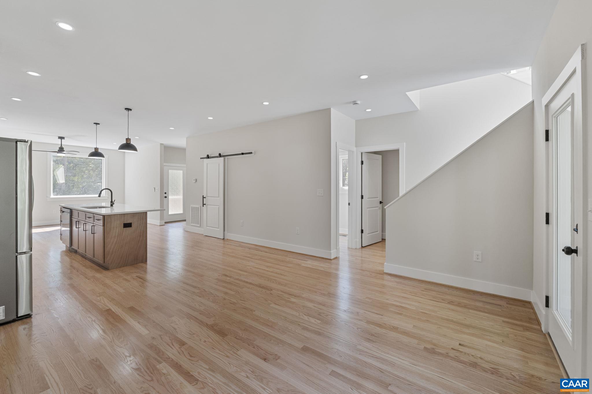 34 Turkeysag Trail Palmyra, VA 22963 - Photo 13 of 55 a big room with wooden floor and windows