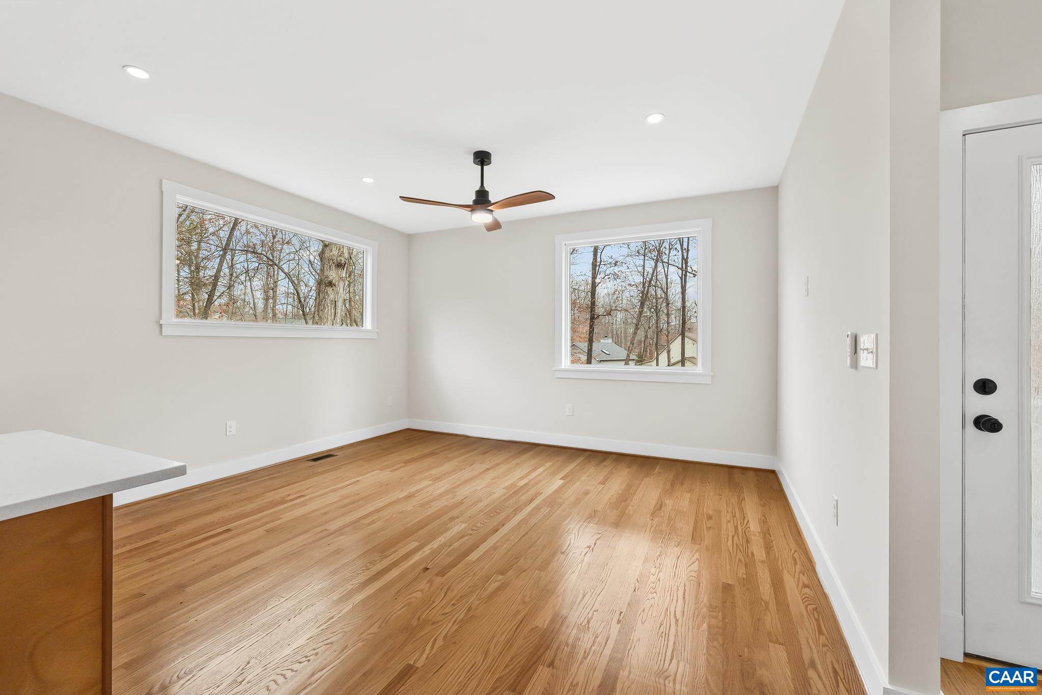 34 Turkeysag Trail Palmyra, VA 22963 - Photo 21 of 55 wooden floor in an empty room with a window