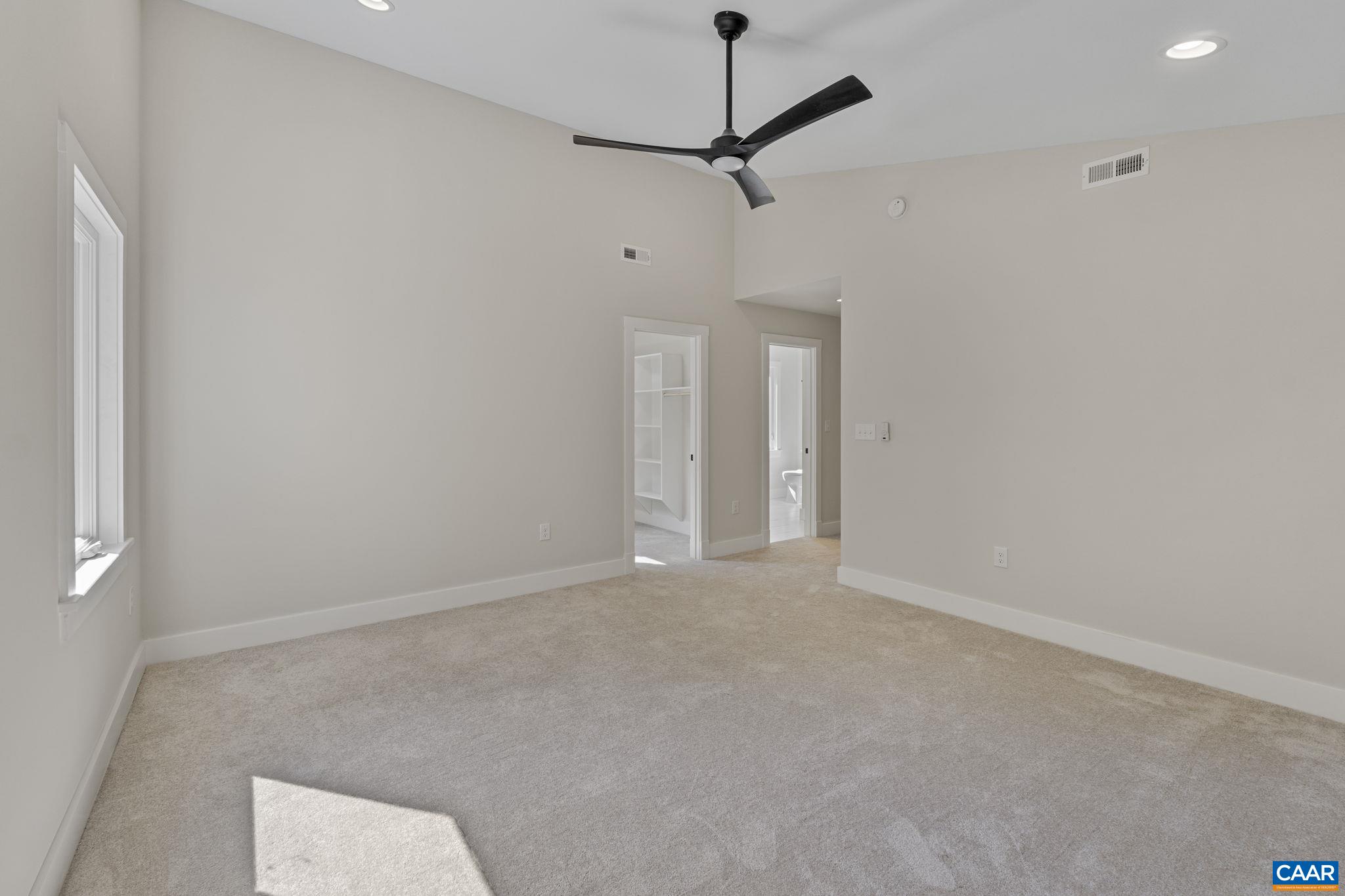 34 Turkeysag Trail Palmyra, VA 22963 - Photo 24 of 55 a view of an empty room with a chandelier