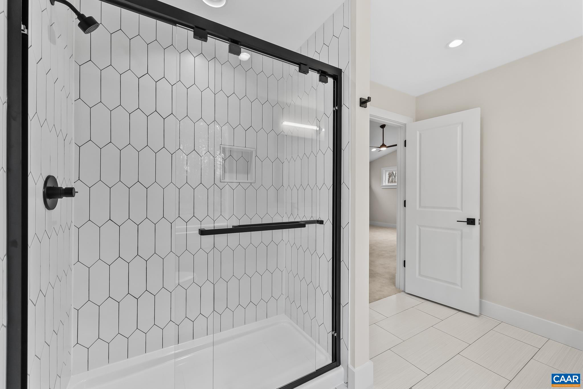 34 Turkeysag Trail Palmyra, VA 22963 - Photo 29 of 55 a bathroom with a shower and a glass door