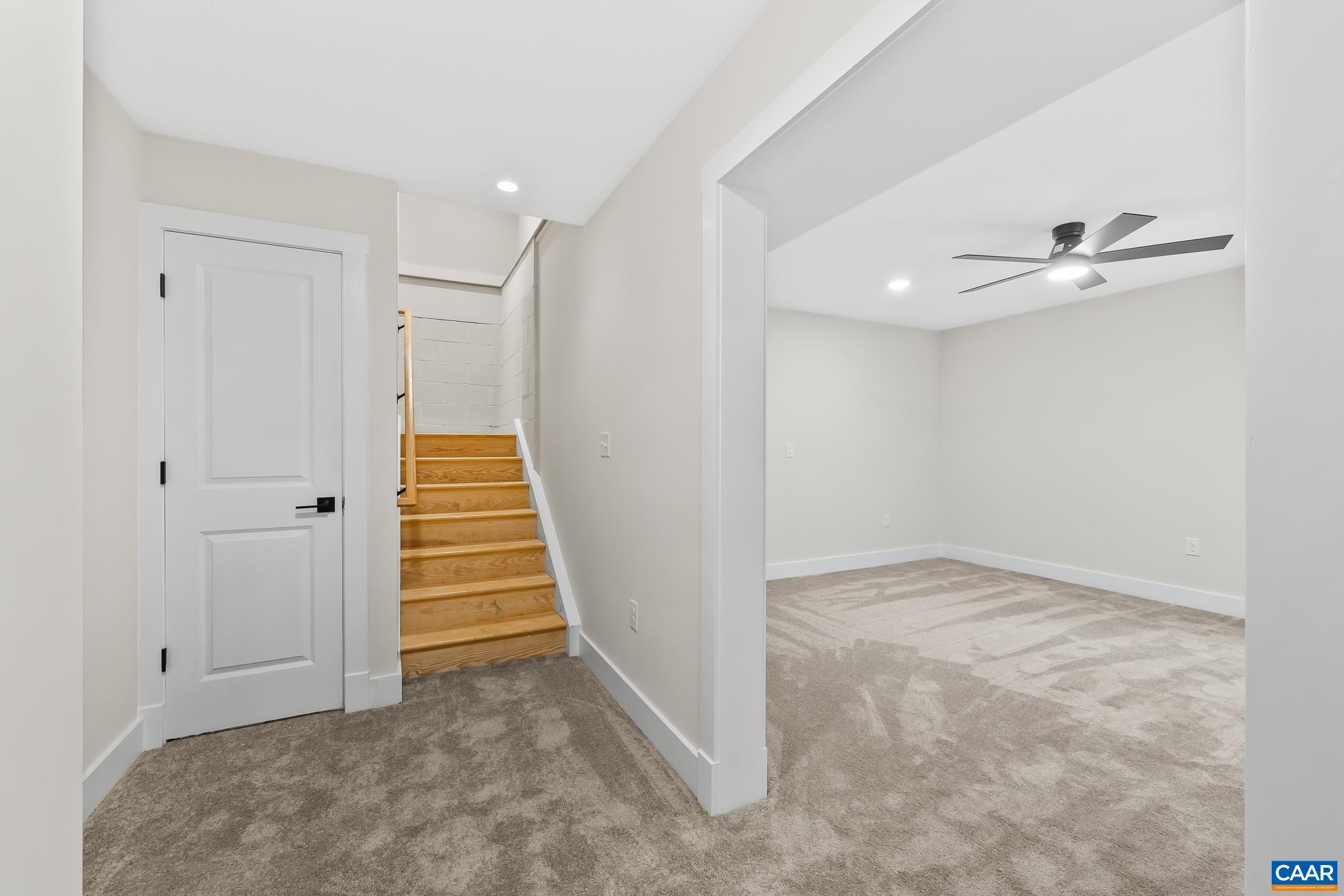 34 Turkeysag Trail Palmyra, VA 22963 - Photo 36 of 55 an empty room with a staircase and white walls