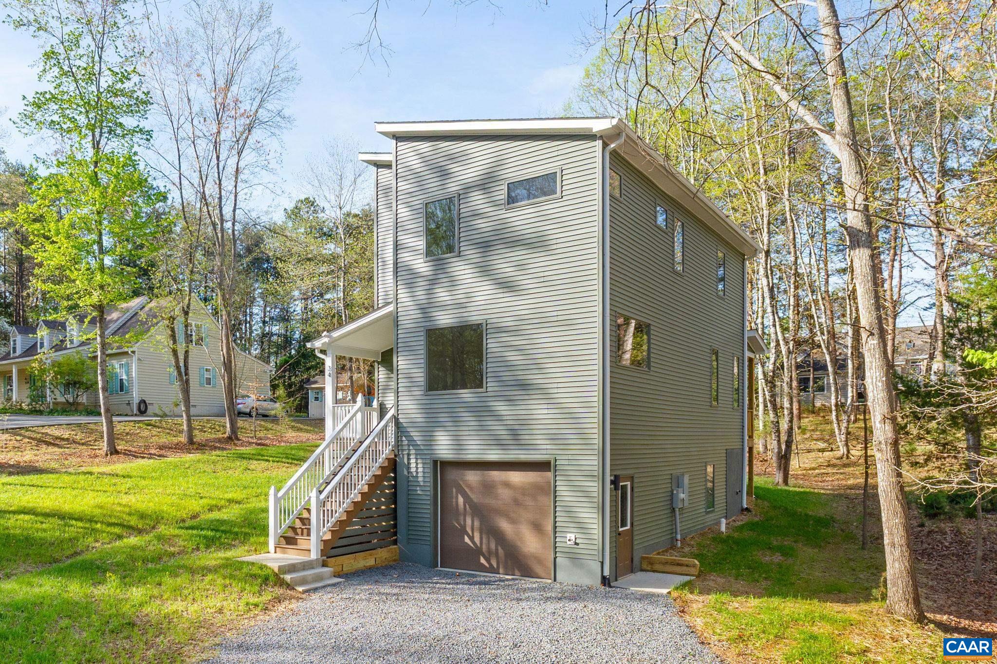 34 Turkeysag Trail Palmyra, VA 22963 - Photo 48 of 55 a front view of a house with a yard