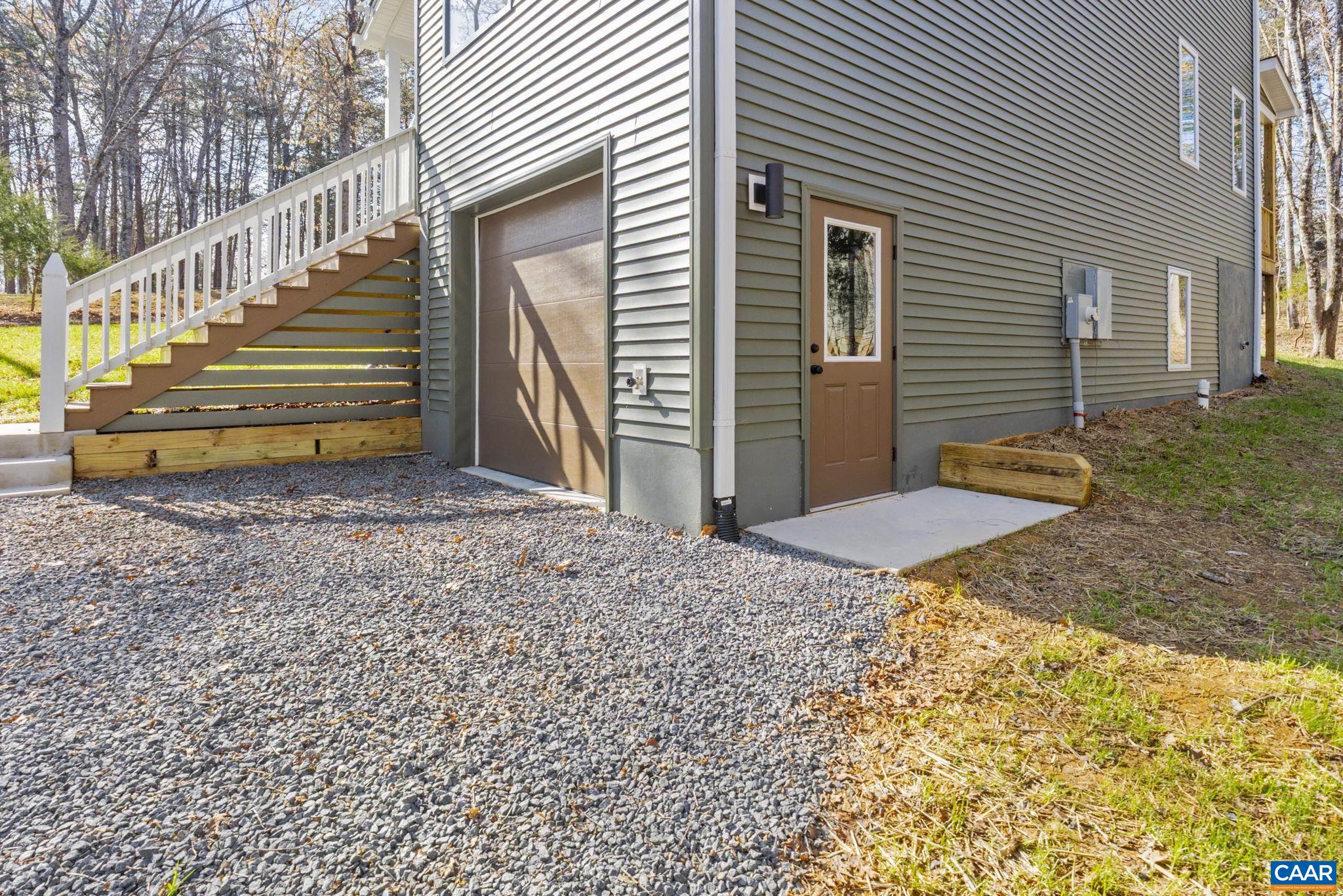 34 Turkeysag Trail Palmyra, VA 22963 - Photo 54 of 55 a backyard of a house with wooden fence and deck