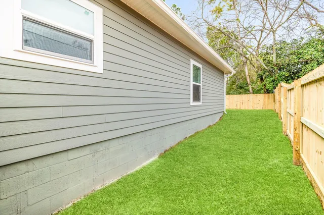 a view of a backyard with a garden