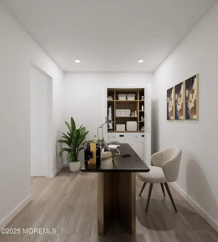 a dining room with furniture and a potted plant