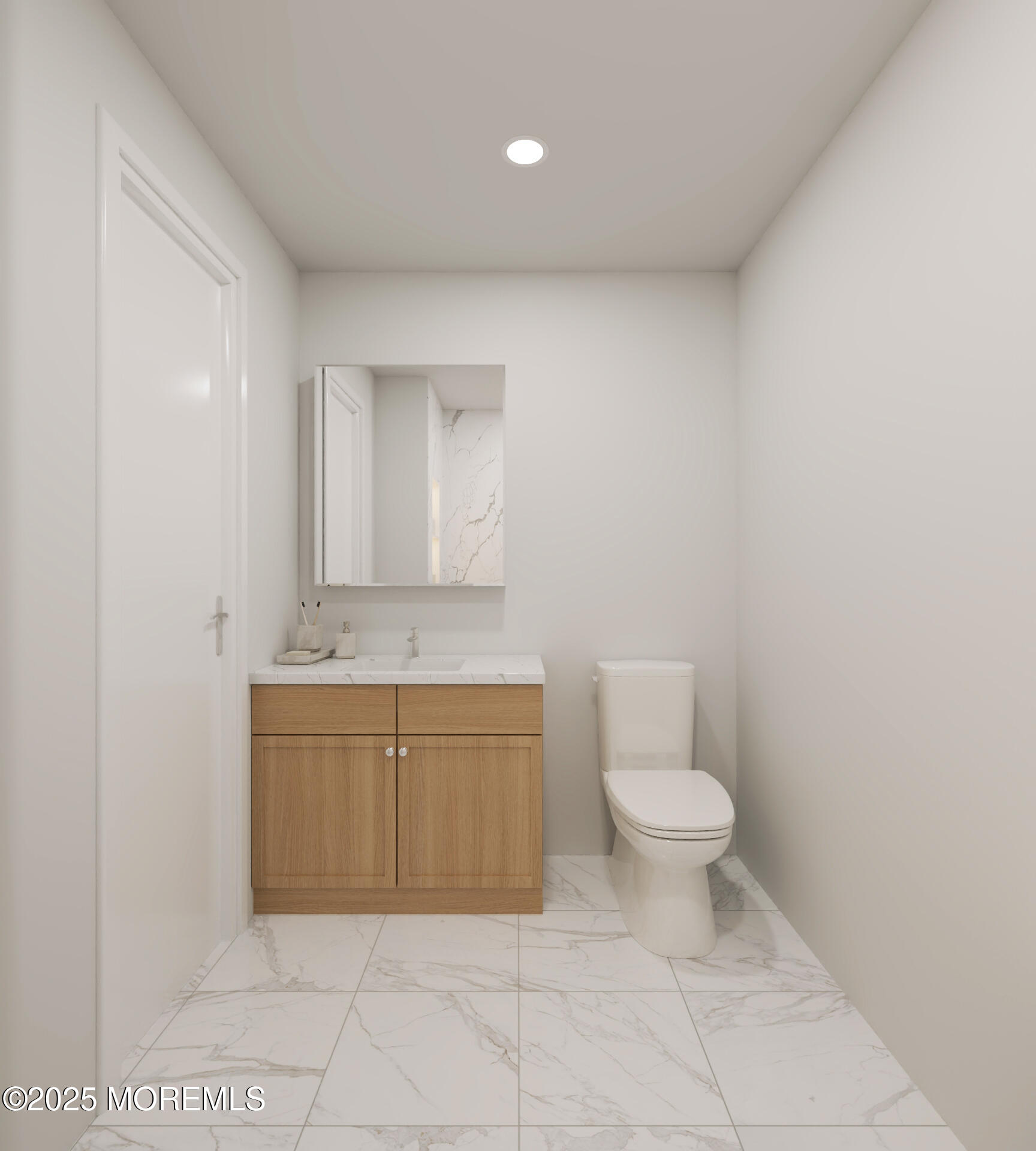 20 3rd Avenue, Unit 305 Long Branch, NJ 07740 - Photo 6 of 9 a bathroom with a granite countertop toilet and a sink