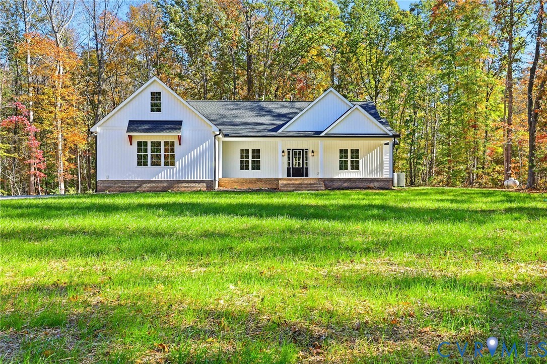 5852 Tucker Road Powhatan, VA 23139 - Photo 3 of 45 Modern farmhouse with a porch, roof with shingles,