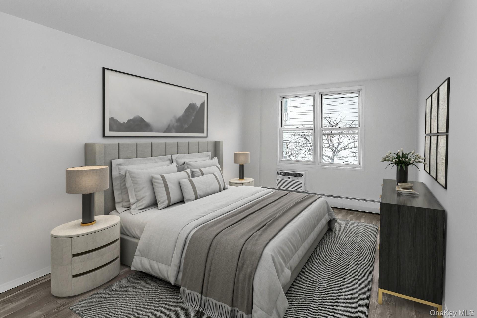 75 Noble Street, Unit 121 Lynbrook, NY 11563 - Photo 13 of 24 a bedroom with bed painting on wall and a window