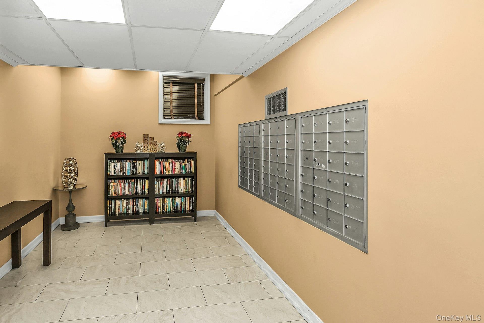 75 Noble Street, Unit 121 Lynbrook, NY 11563 - Photo 20 of 24 a view of entryway with stairs