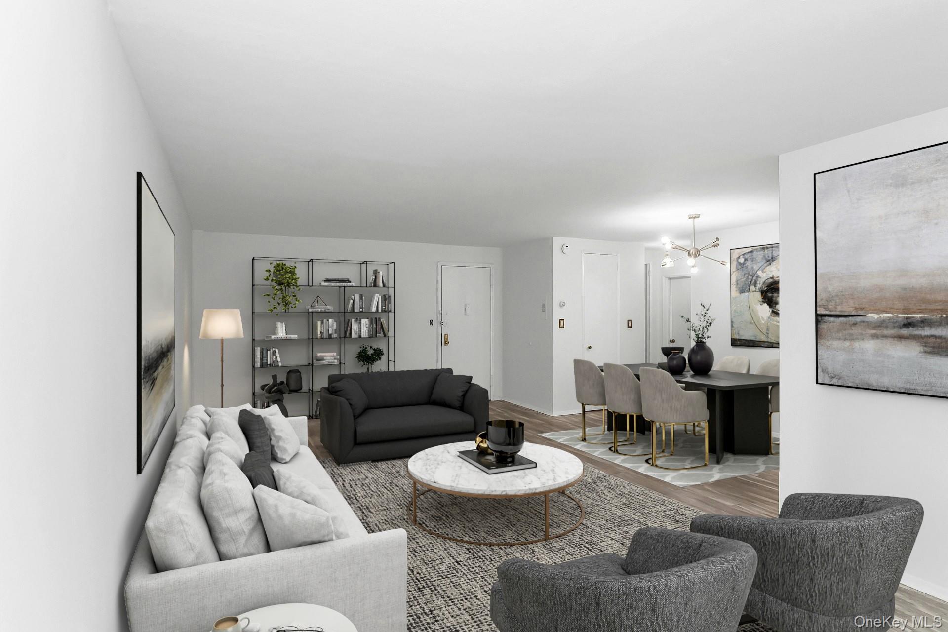 75 Noble Street, Unit 121 Lynbrook, NY 11563 - Photo 7 of 24 a living room with furniture and a table