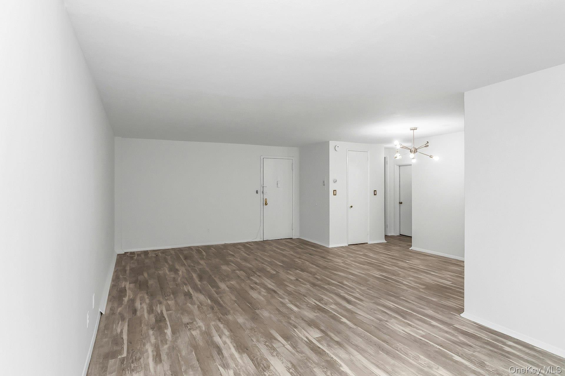 75 Noble Street, Unit 121 Lynbrook, NY 11563 - Photo 8 of 24 a view of empty room