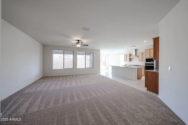 a view of a kitchen with a sink cabinets and window