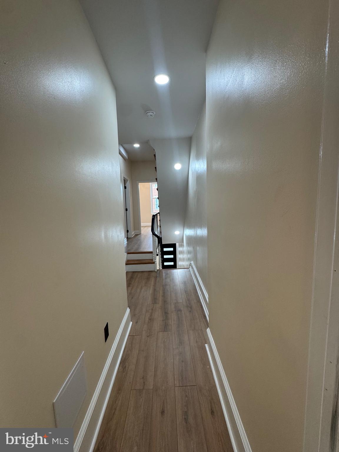 856 Perkiomen Street Philadelphia, PA 19130 - Photo 21 of 29 a view of a hallway with wooden floor