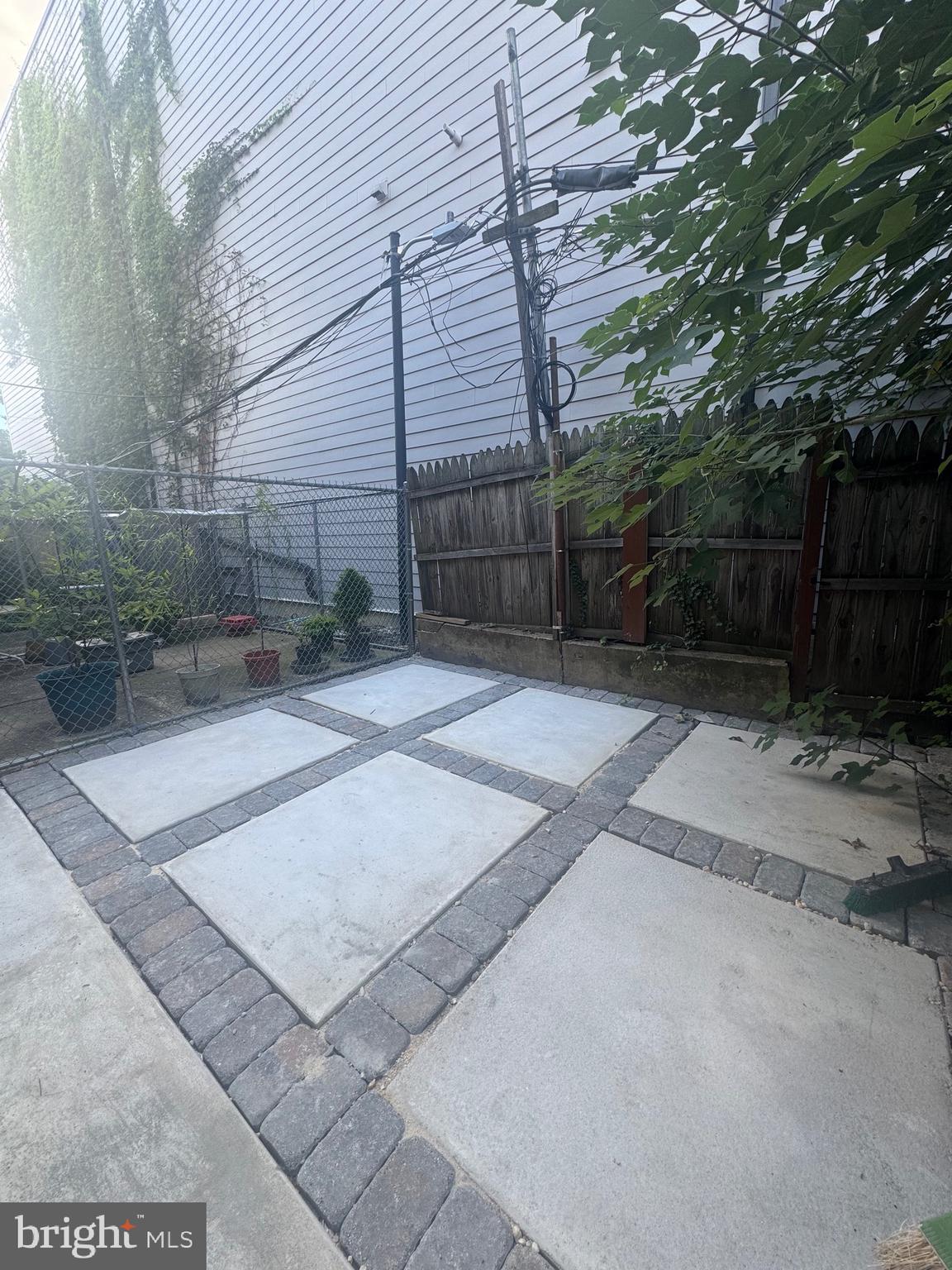 856 Perkiomen Street Philadelphia, PA 19130 - Photo 29 of 29 a view of backyard with plants and trees