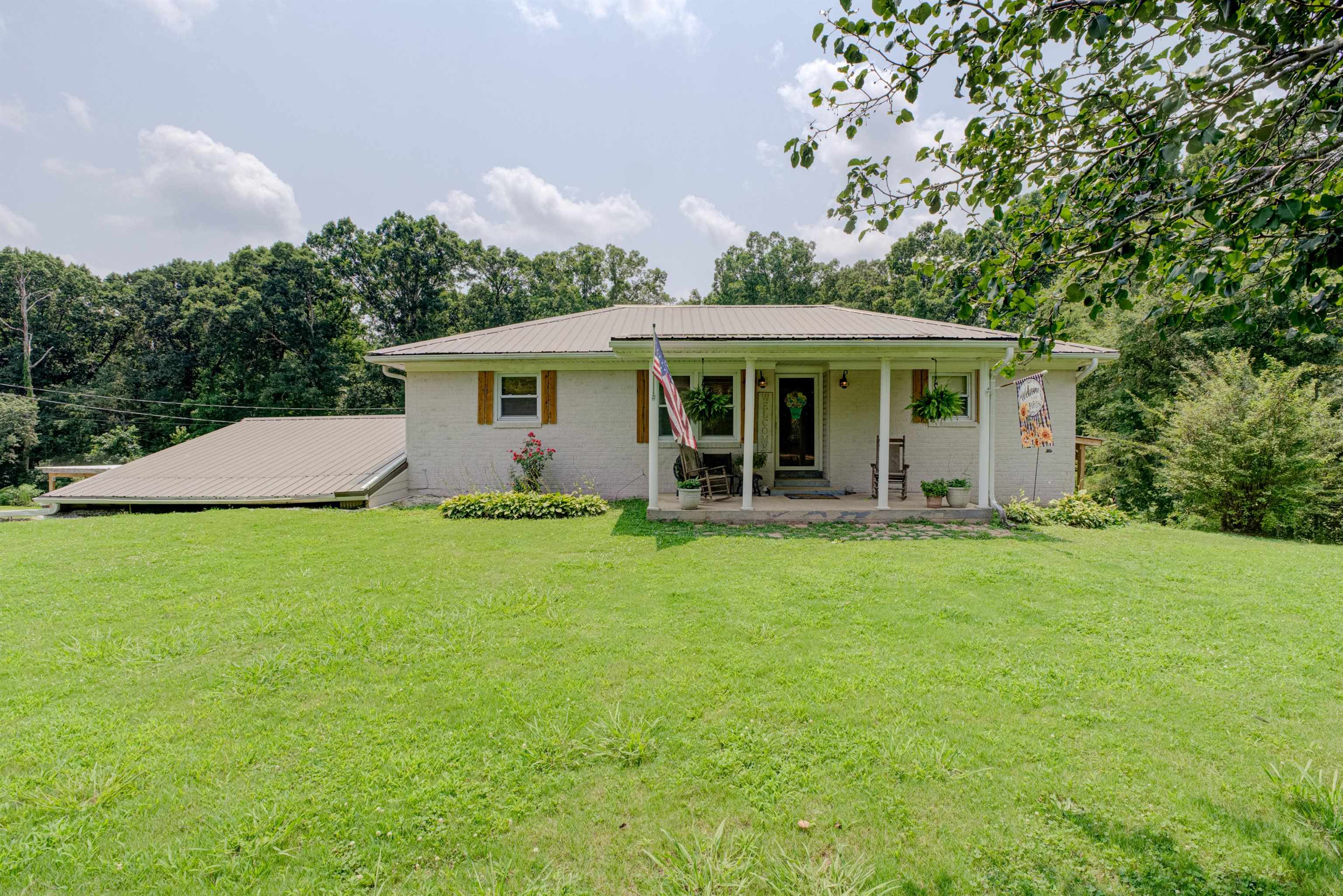 105 Jody Road Medon, TN 38356 - Photo 1 of 33 a view of a house with backyard and garden