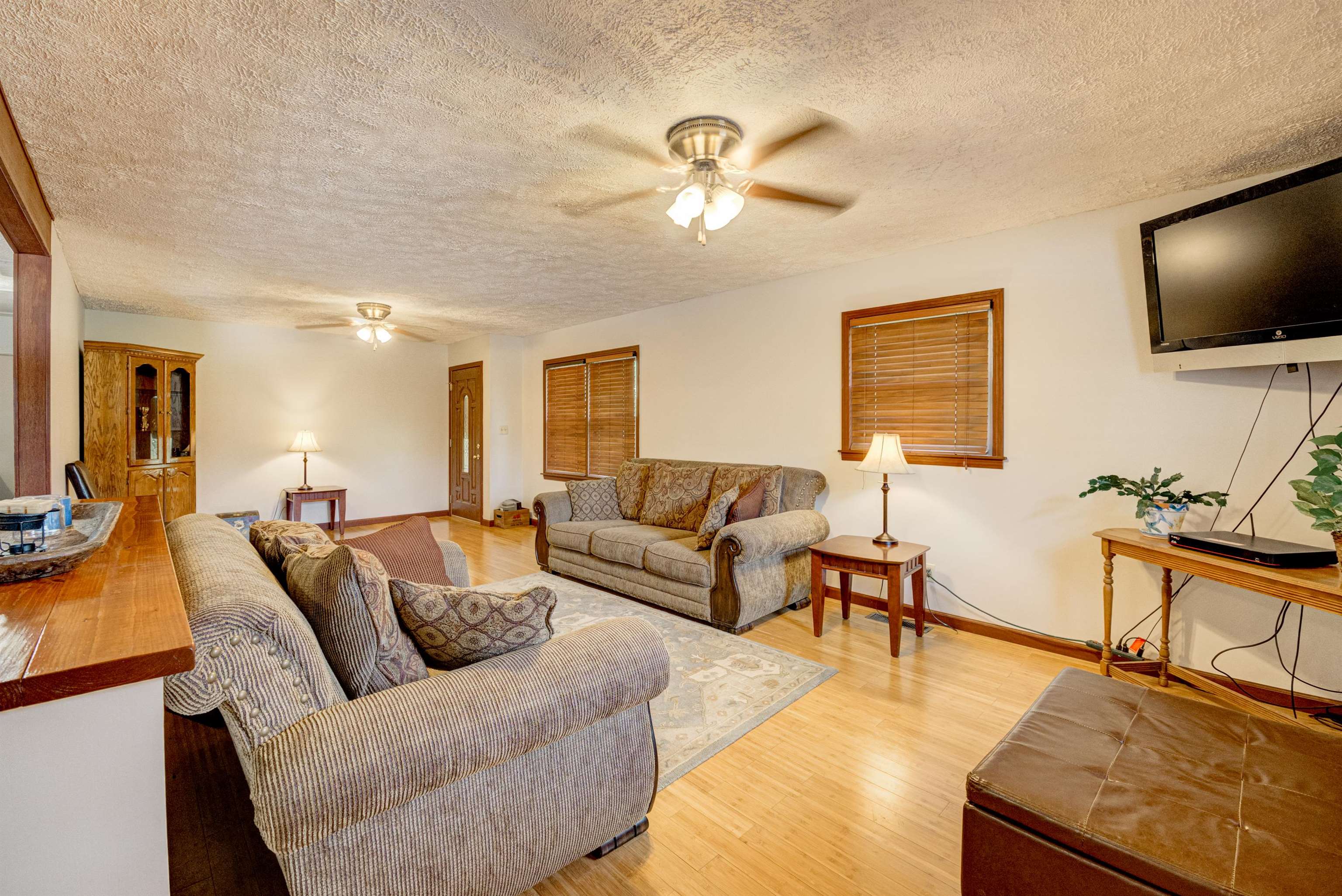105 Jody Road Medon, TN 38356 - Photo 8 of 33 a living room with furniture and a flat screen tv