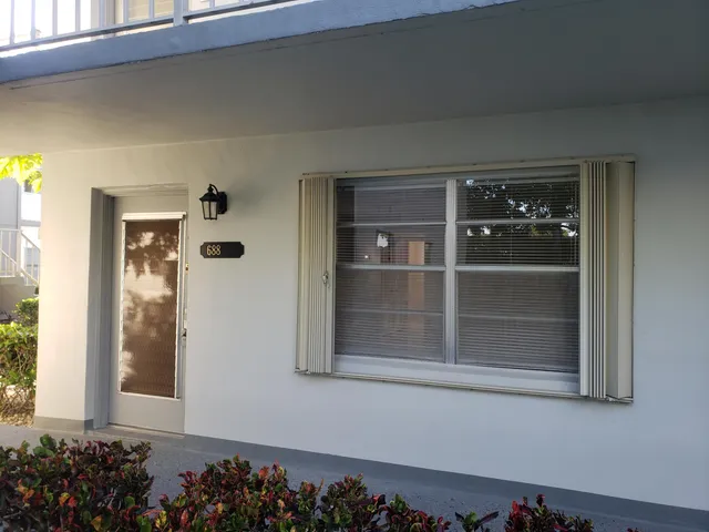 a view of a room that has a window