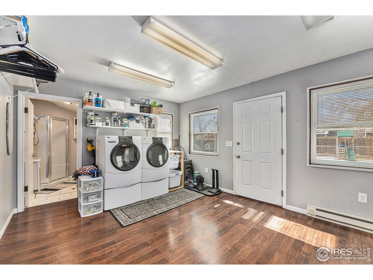7849 First Street Wellington, CO 80549 - Photo 15 of 20 Laundry / Mudroom & 2nd 3/4 Bathroom