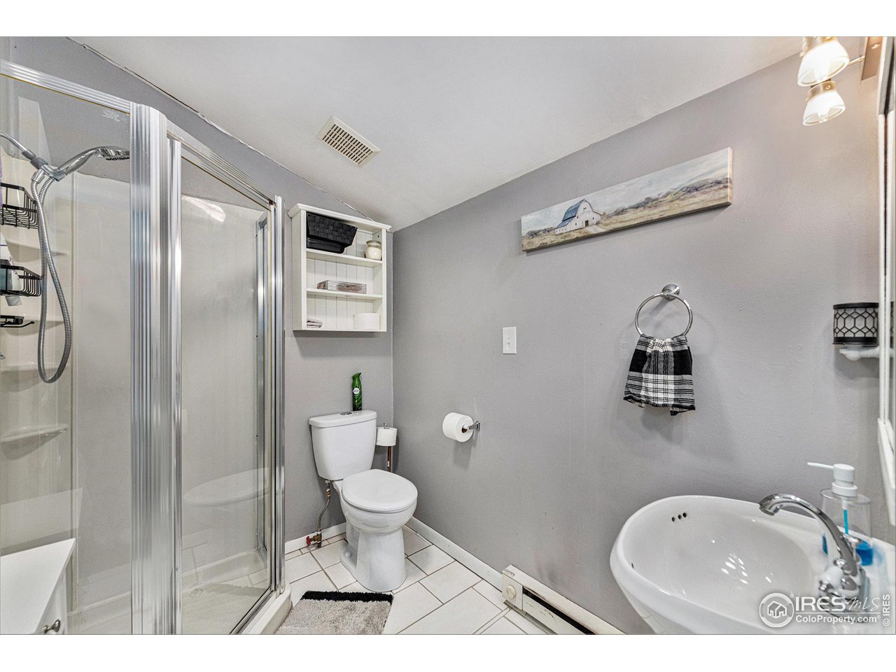 7849 First Street Wellington, CO 80549 - Photo 16 of 20 3/4 Bathroom - tile, baseboard heat