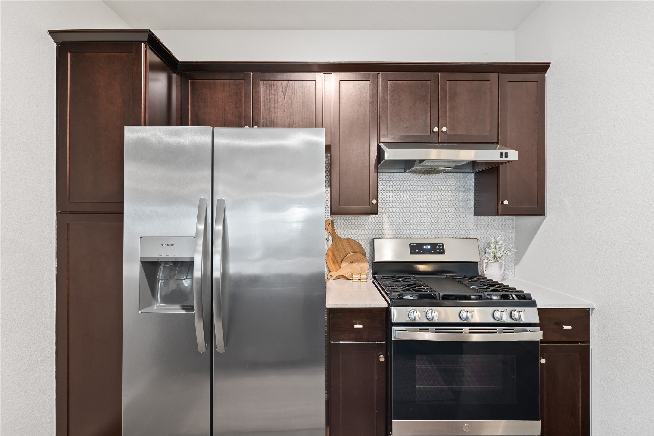 7101 Spirit Hill Road Austin, TX 78744 - Photo 15 of 40 Well appointed kitchen with Penny tile backsplash detail and great cabinet storage.