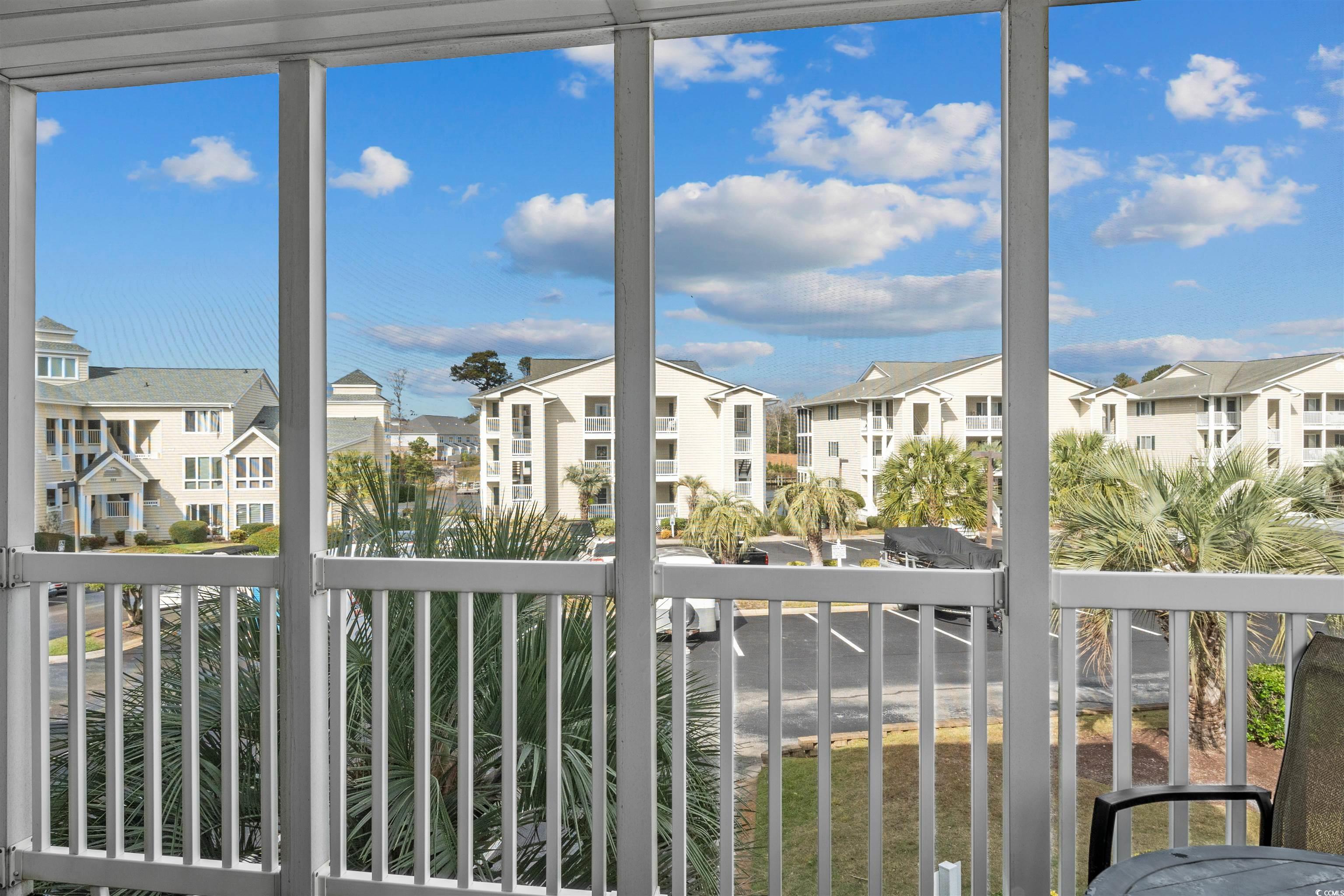 207 Landing Road, Unit F North Myrtle Beach, SC 29582 - Photo 12 of 27 View of unfurnished sunroom