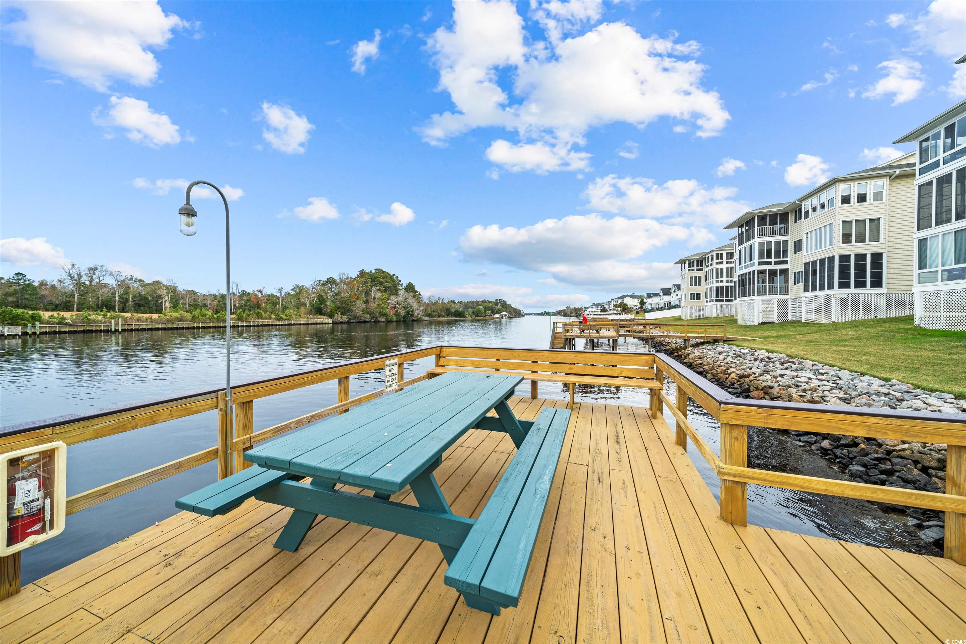 207 Landing Road, Unit F North Myrtle Beach, SC 29582 - Photo 25 of 27 View of dock with a water view
