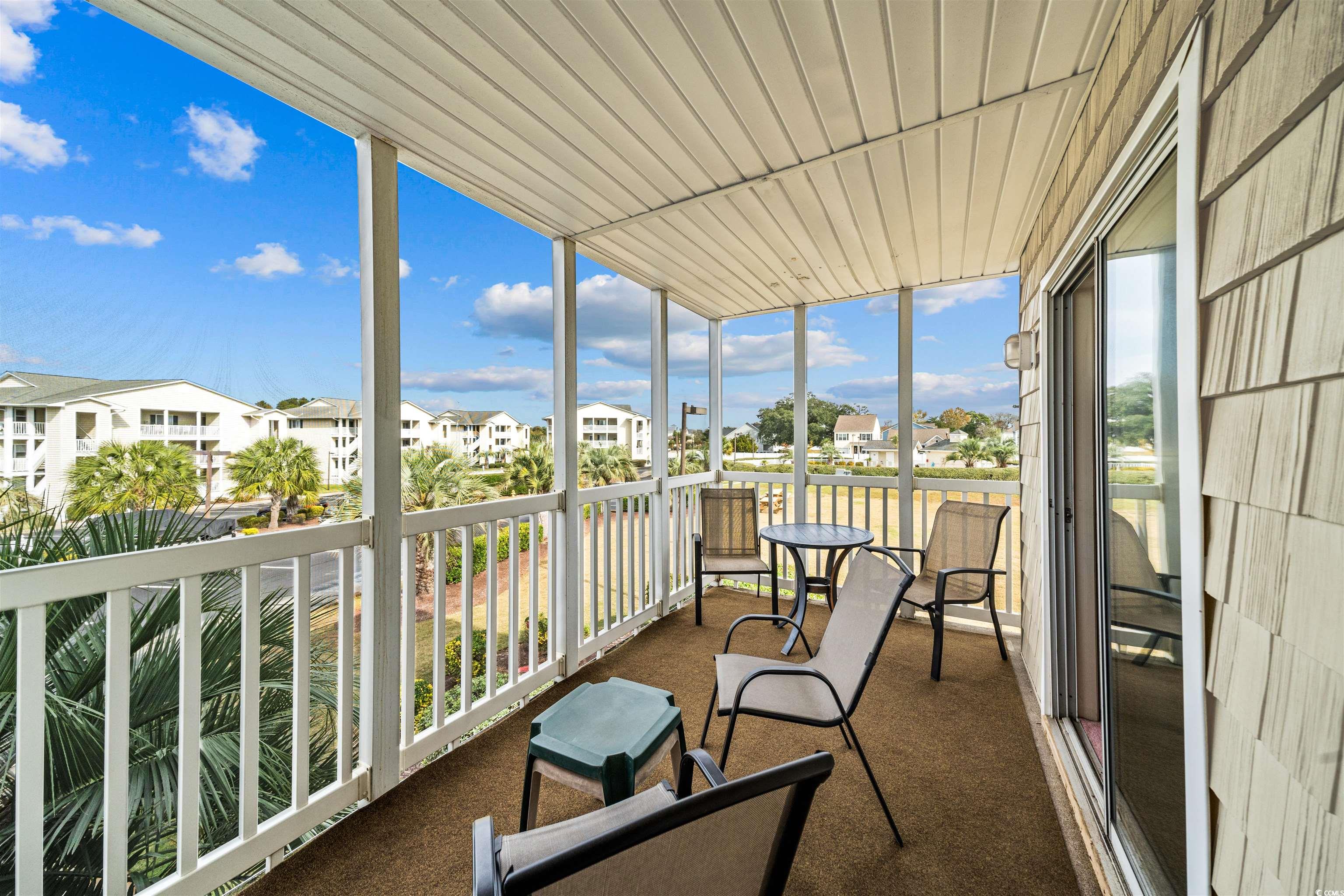 207 Landing Road, Unit F North Myrtle Beach, SC 29582 - Photo 10 of 27 Unfurnished sunroom featuring a healthy amount of