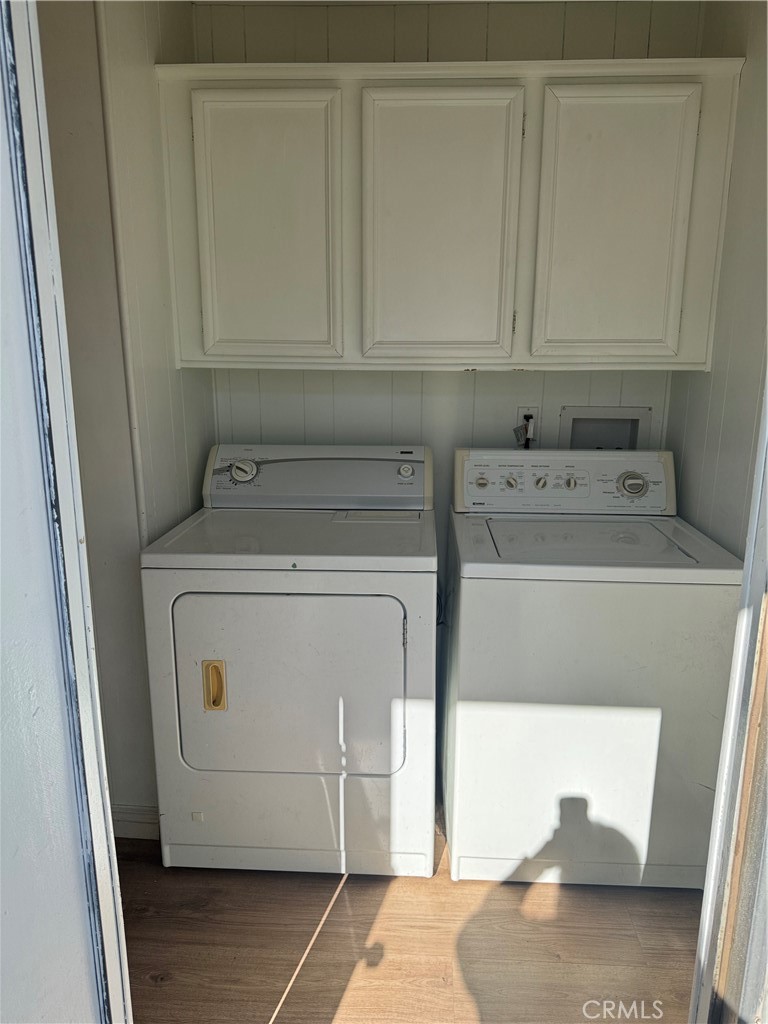 2751 Reche Canyon Road, Unit 4 Moreno Valley, CA 92555 - Photo 12 of 12 a utility room with dryer and washer