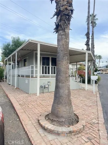 a front view of a house with a porch