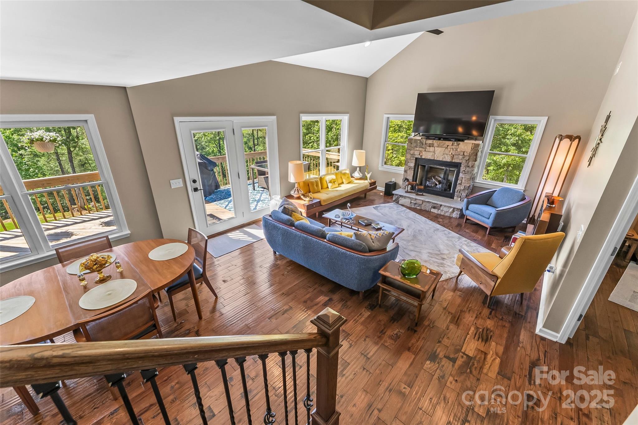 2508 Wolf Pit Road Morganton, NC 28655 - Photo 11 of 48 a living room with furniture and a flat screen tv