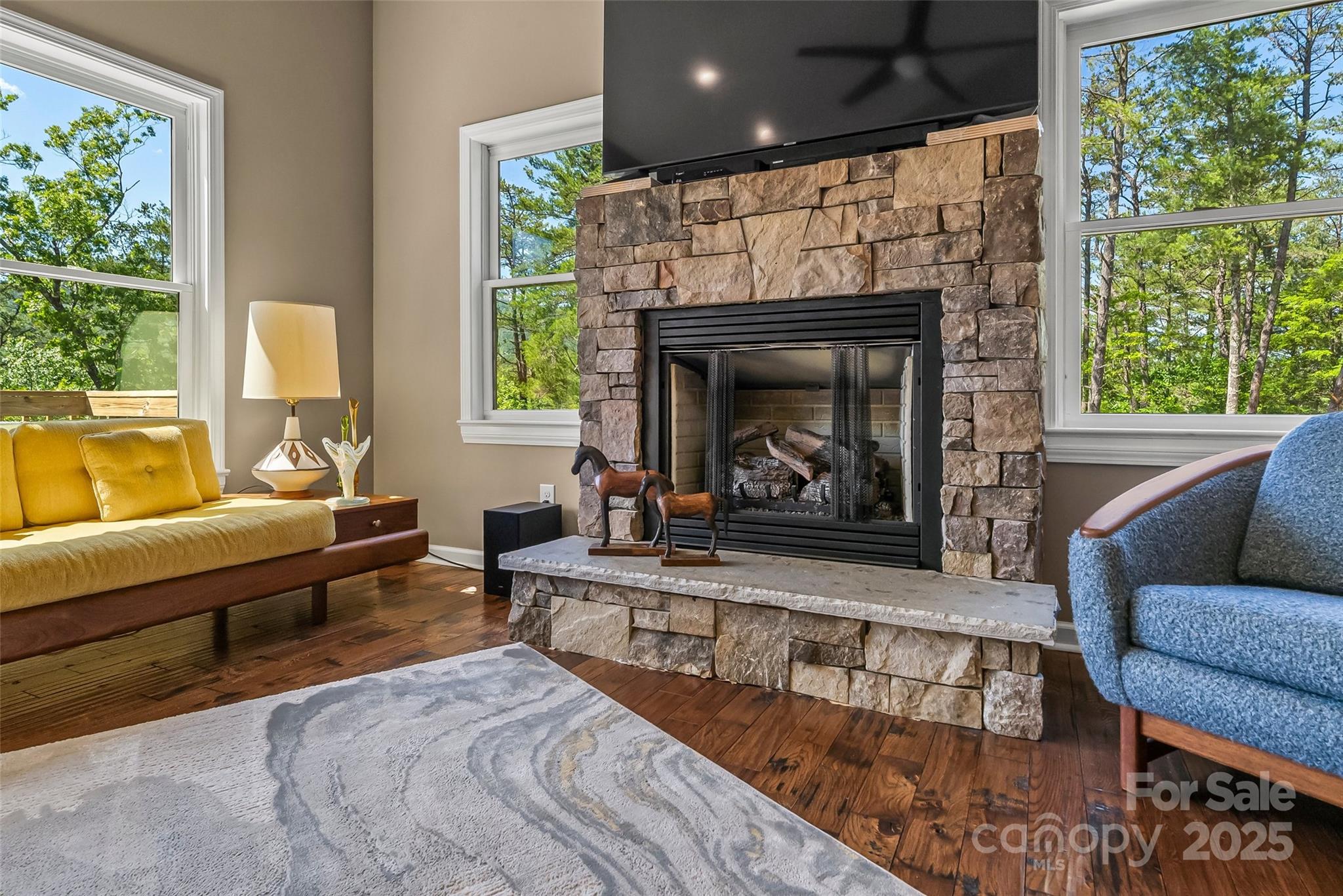 2508 Wolf Pit Road Morganton, NC 28655 - Photo 12 of 48 a living room with furniture and a fireplace