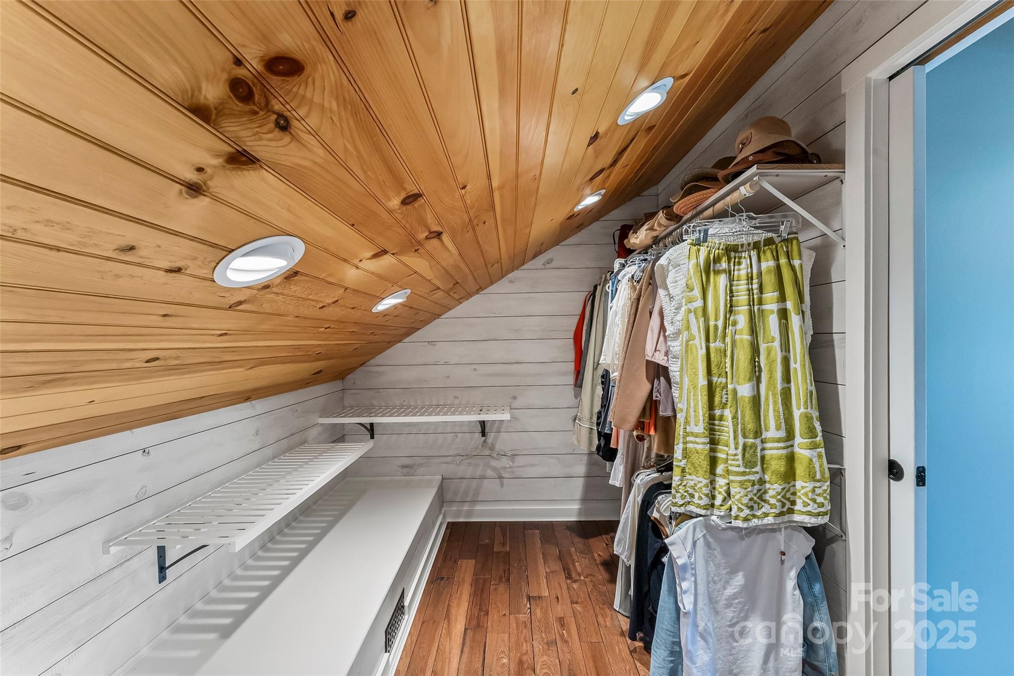 2508 Wolf Pit Road Morganton, NC 28655 - Photo 19 of 48 a view of walk in closet with wooden floor