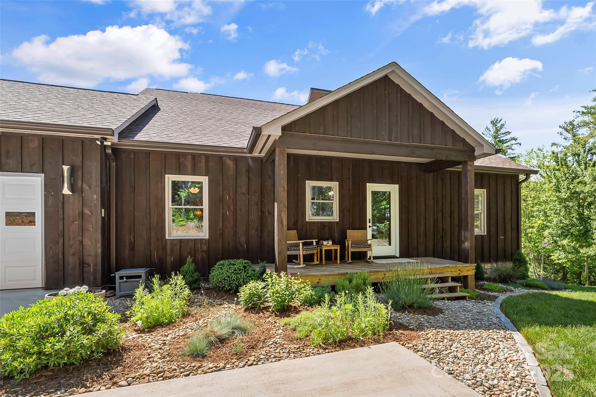 2508 Wolf Pit Road Morganton, NC 28655 - Photo 2 of 48 a front view of a house with garden