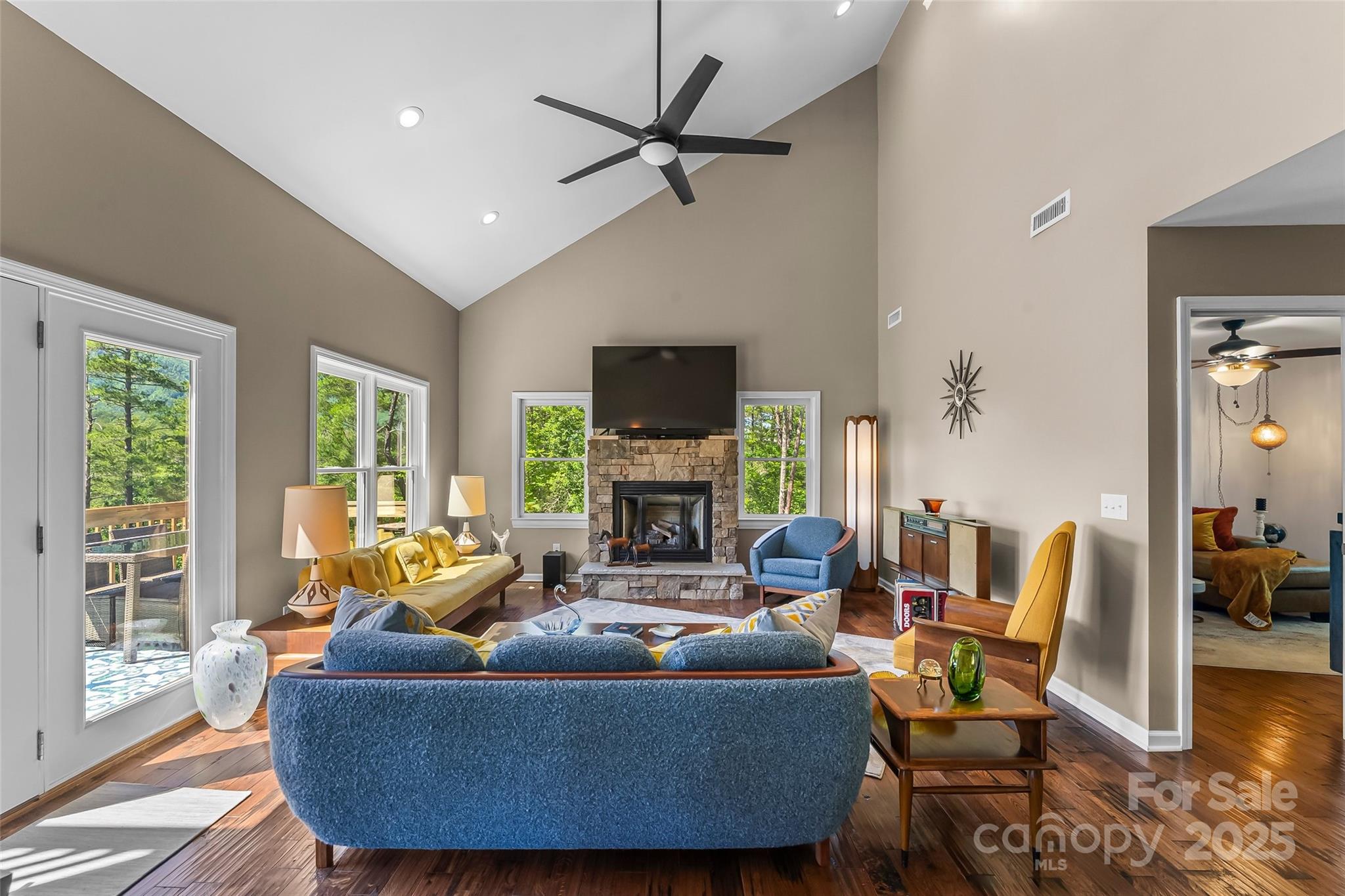 2508 Wolf Pit Road Morganton, NC 28655 - Photo 3 of 48 a living room with furniture fireplace and a large window