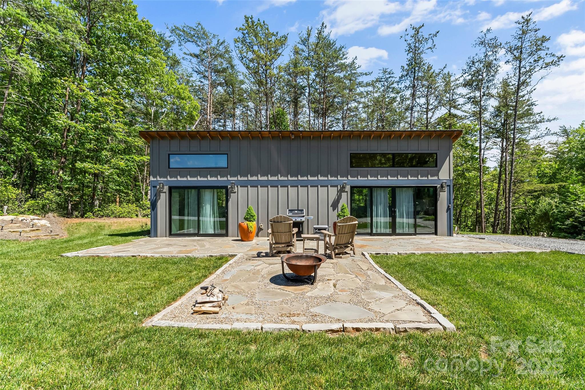 2508 Wolf Pit Road Morganton, NC 28655 - Photo 34 of 48 a view of a house with backyard and sitting area