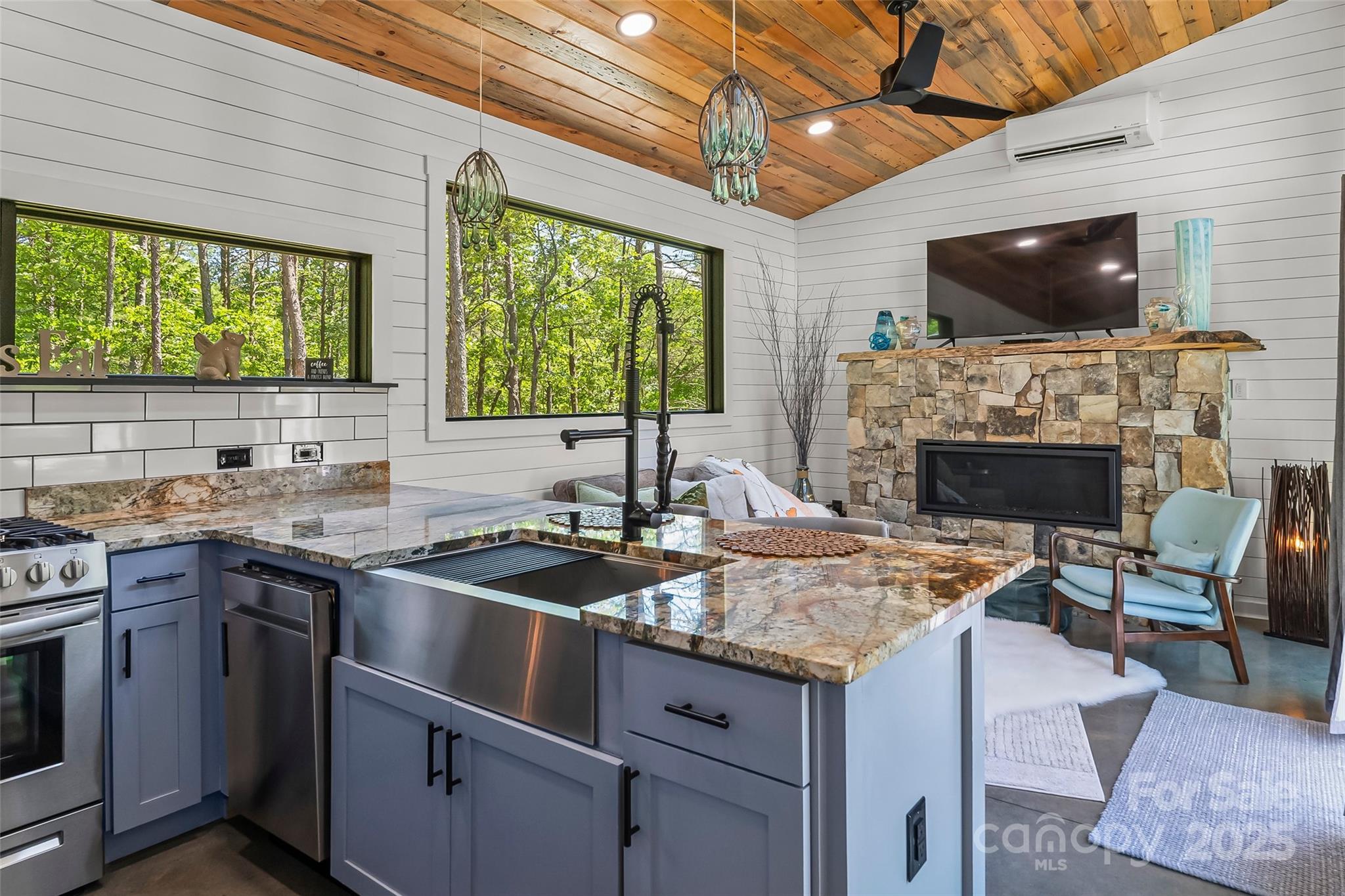 2508 Wolf Pit Road Morganton, NC 28655 - Photo 38 of 48 a kitchen with a sink stove and microwave