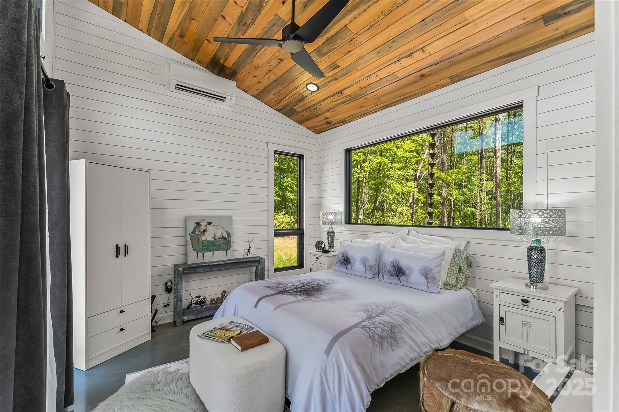 2508 Wolf Pit Road Morganton, NC 28655 - Photo 39 of 48 a bedroom with a bed and a large window