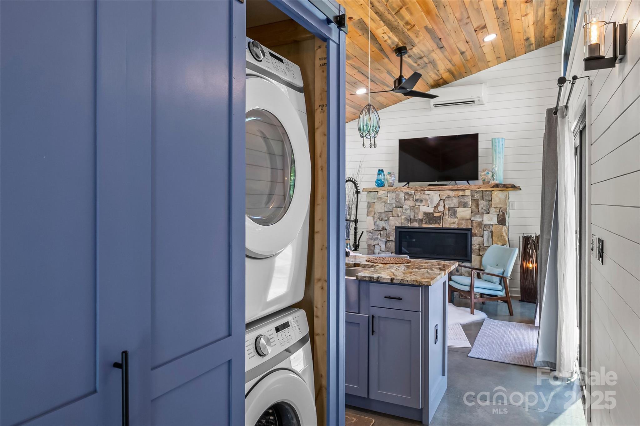 2508 Wolf Pit Road Morganton, NC 28655 - Photo 41 of 48 a view of a livingroom with washer and dryer