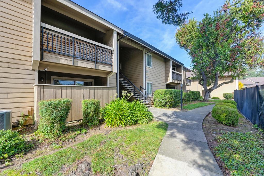 9160 Madison Avenue, Unit 68 Fair Oaks, CA 95628 - Photo 1 of 35 a front view of house with green space