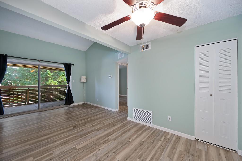 9160 Madison Avenue, Unit 68 Fair Oaks, CA 95628 - Photo 13 of 35 wooden floor in an empty room with a window