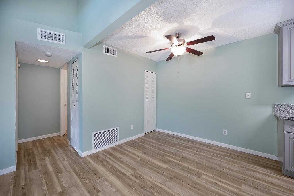 9160 Madison Avenue, Unit 68 Fair Oaks, CA 95628 - Photo 14 of 35 a view of empty room with wooden floor