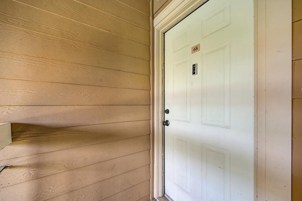 9160 Madison Avenue, Unit 68 Fair Oaks, CA 95628 - Photo 6 of 35 a bathroom with a glass shower door