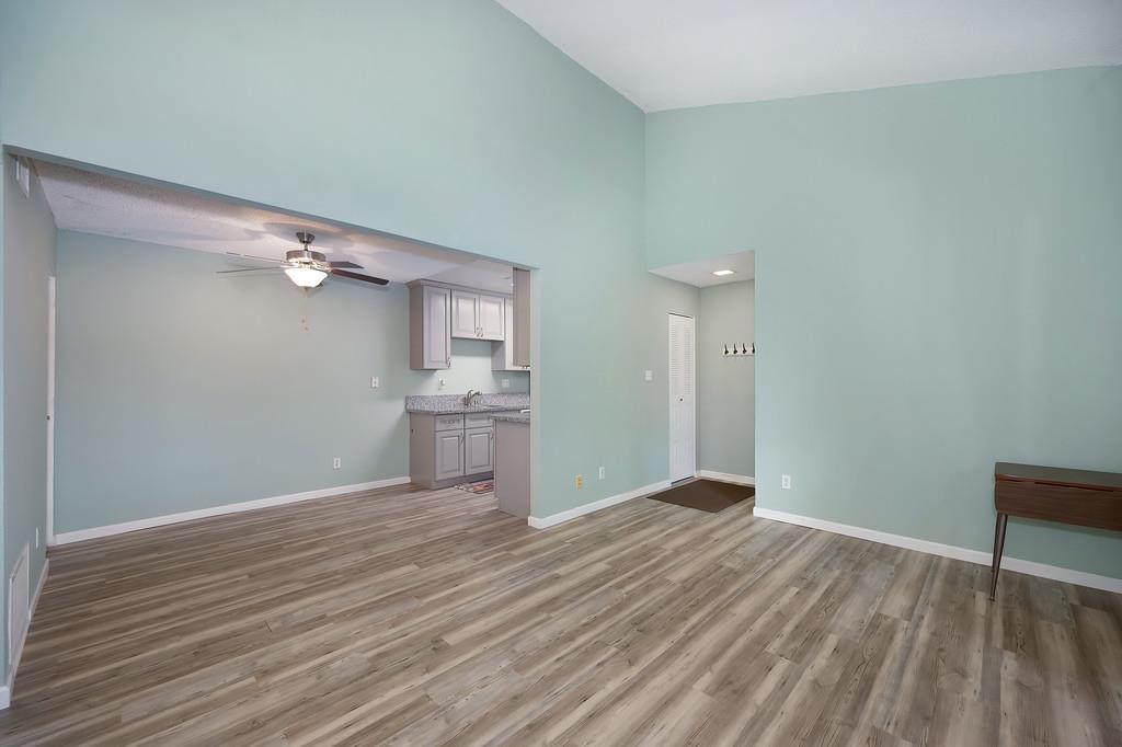 9160 Madison Avenue, Unit 68 Fair Oaks, CA 95628 - Photo 9 of 35 a view of a kitchen with wooden floor