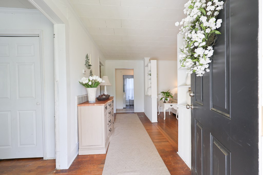 211 Williams Street Valley, AL 36854 - Photo 11 of 28 a hallway with painting and flowers