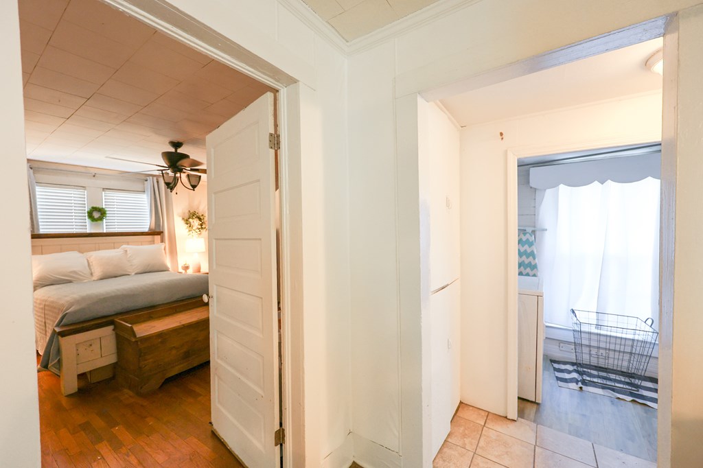 211 Williams Street Valley, AL 36854 - Photo 25 of 28 a en suite bathroom with a granite countertop sink and a mirror