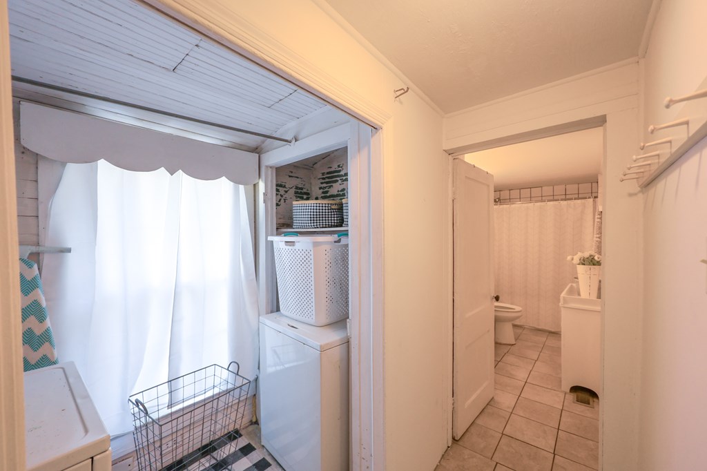211 Williams Street Valley, AL 36854 - Photo 26 of 28 a bathroom with a sink and a mirror