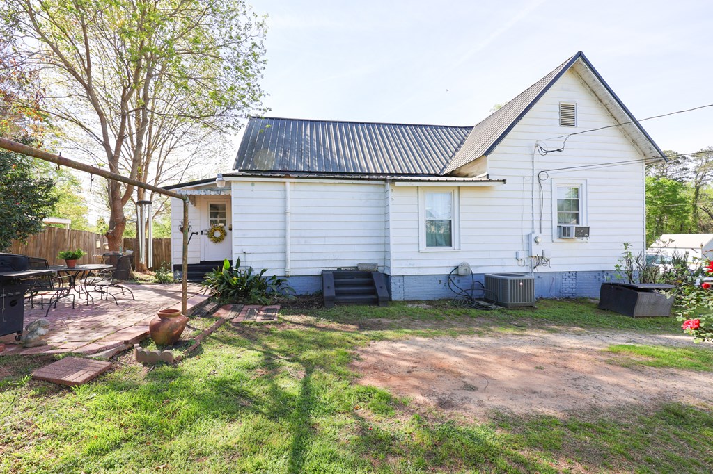 211 Williams Street Valley, AL 36854 - Photo 7 of 28 a view of a backyard with a garden