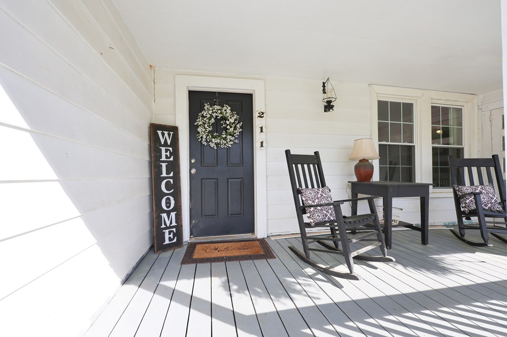 211 Williams Street Valley, AL 36854 - Photo 8 of 28 a view of a livingroom with furniture and front door