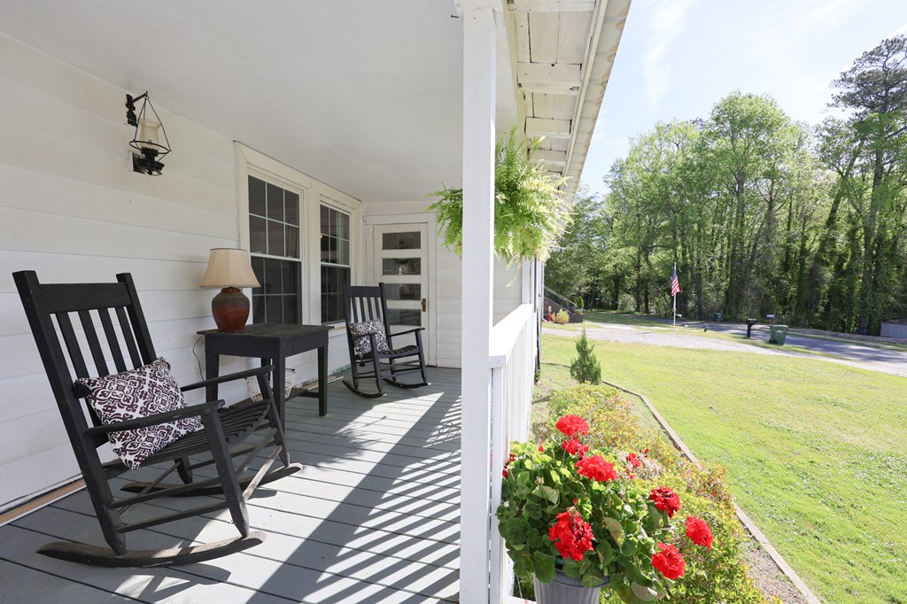 211 Williams Street Valley, AL 36854 - Photo 9 of 28 a swimming pool with outdoor seating and yard