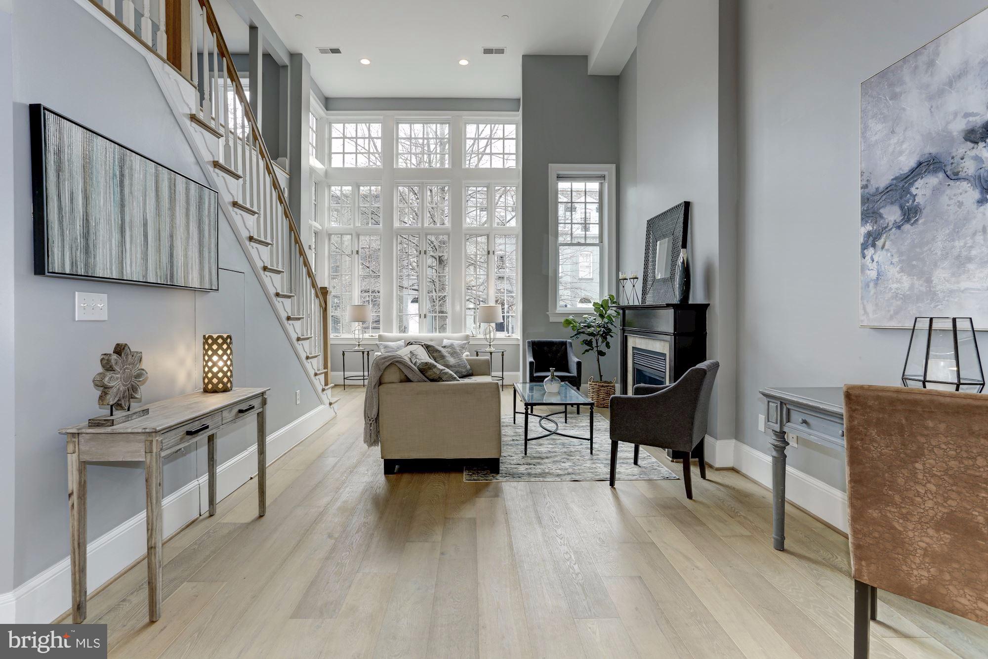 1515 P Street Northwest, Unit 2 Washington, DC 20005 - Photo 2 of 17 Soaring Ceilings with Serene Tree-Top Views